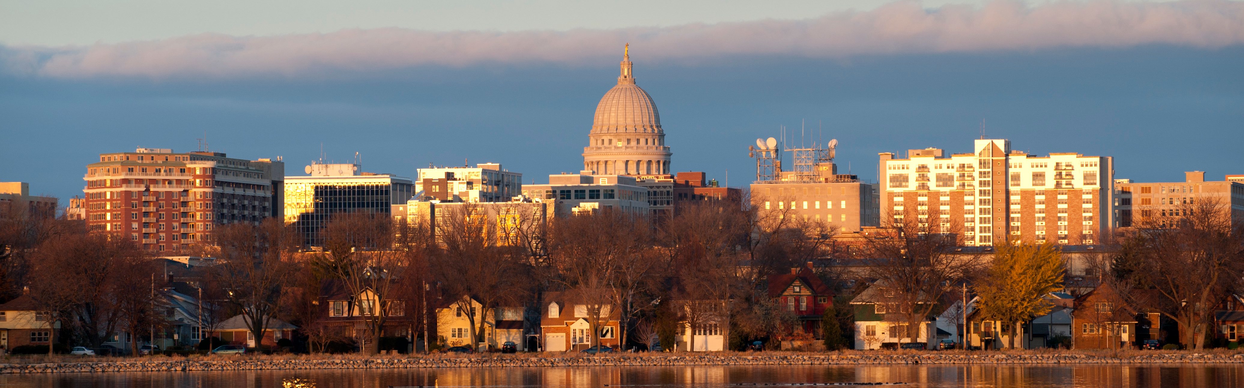 Madison skyline at sunset from Lake Mendota in fall